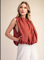 Sleeveless Pleated Balloon Top with Pockets.
