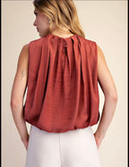 Sleeveless Pleated Balloon Top with Pockets.